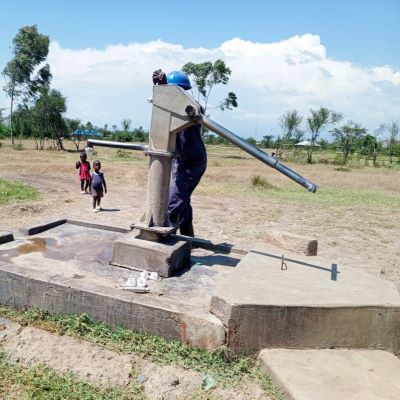 Siany Ayweyo  village hand pump undergoing repair 