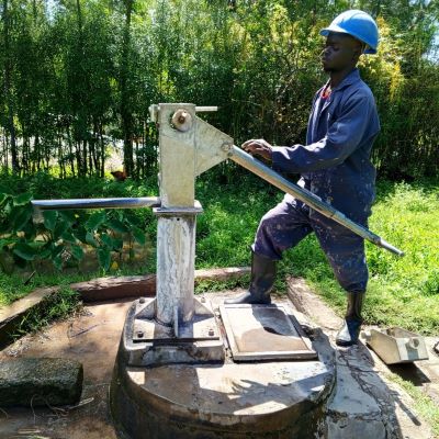 Village hand pump undergoing repairs