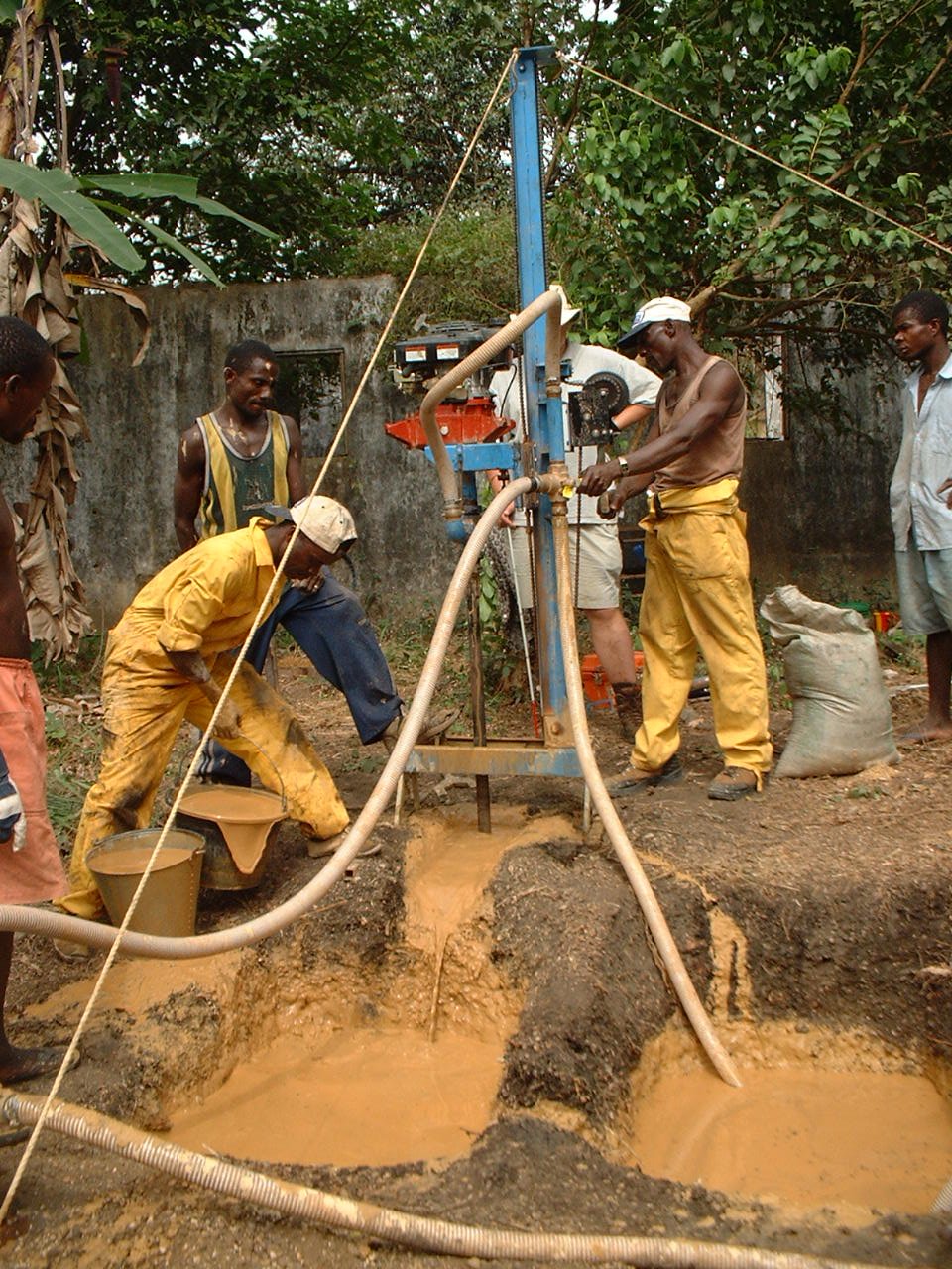 Team "A" Drilling Well for Needy Village
