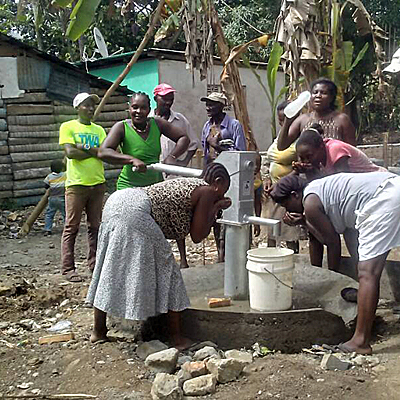 Drinking from New Village Well