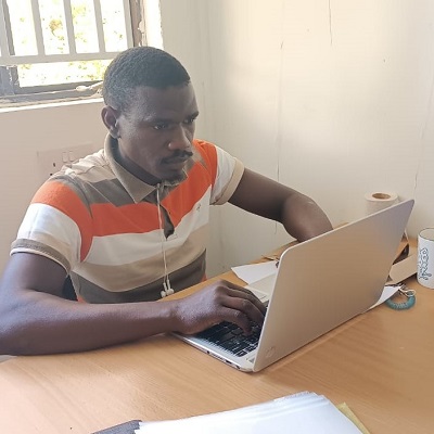 Larry Oyuga at work