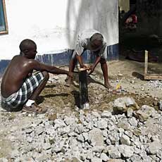 Preparing borehole for Pump