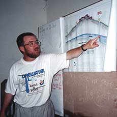 Glenn Teaching Liberian workers to build pads