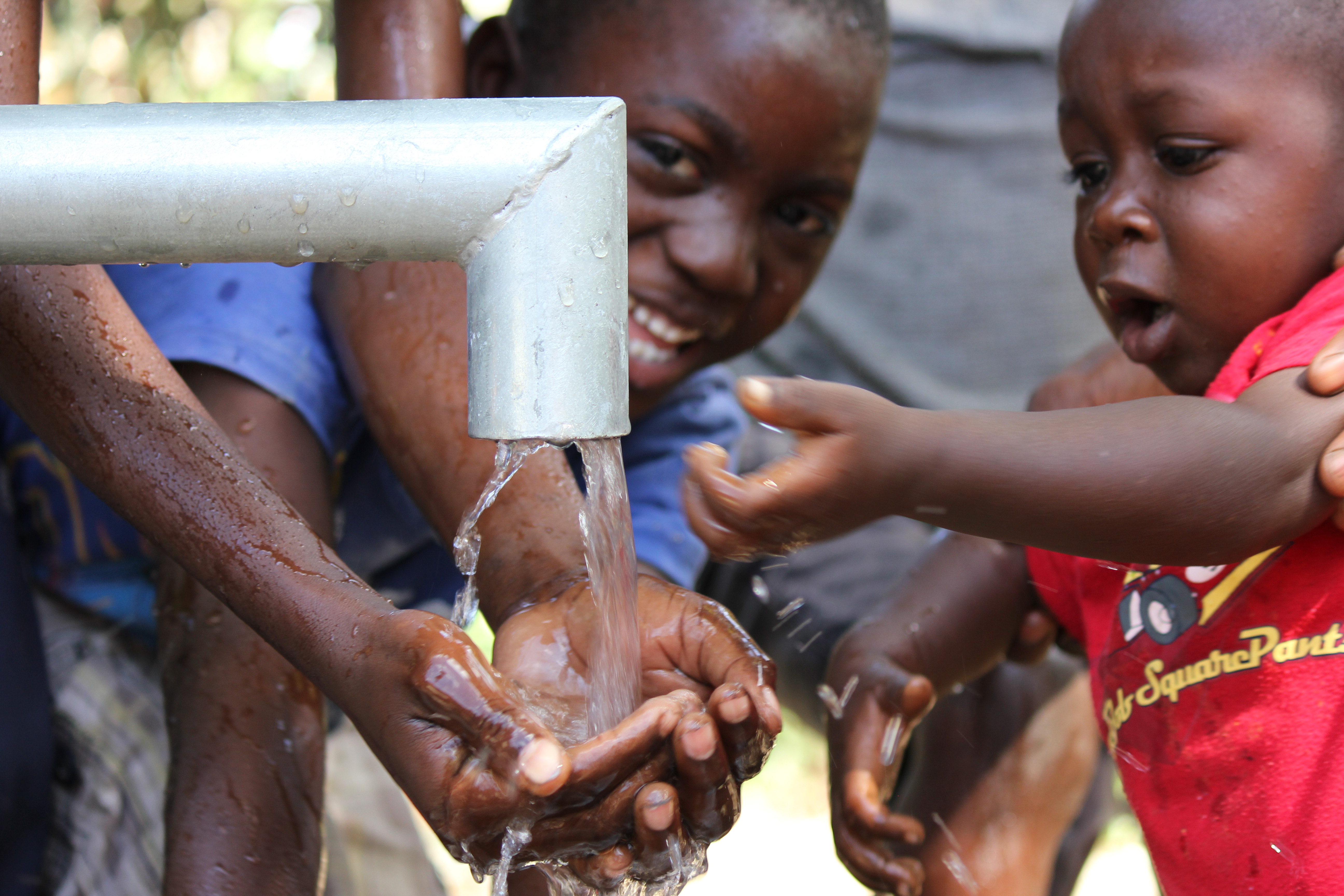 Safe water flowing in Haiti.JPG 2 MB