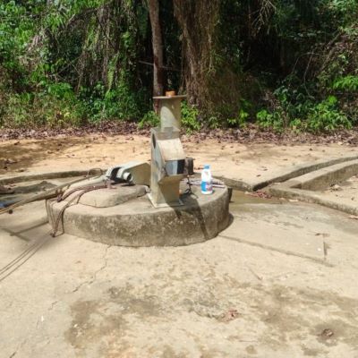 Well's hand pump undergoing repair 