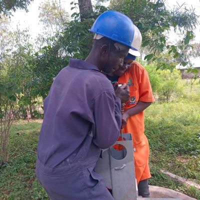 The team working to restore the community's clean source of water