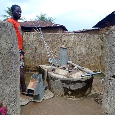 Hand pump undergoing repair 