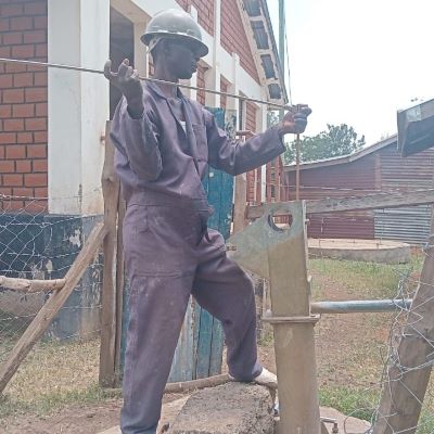 Village hand pump undergoing repairs 
