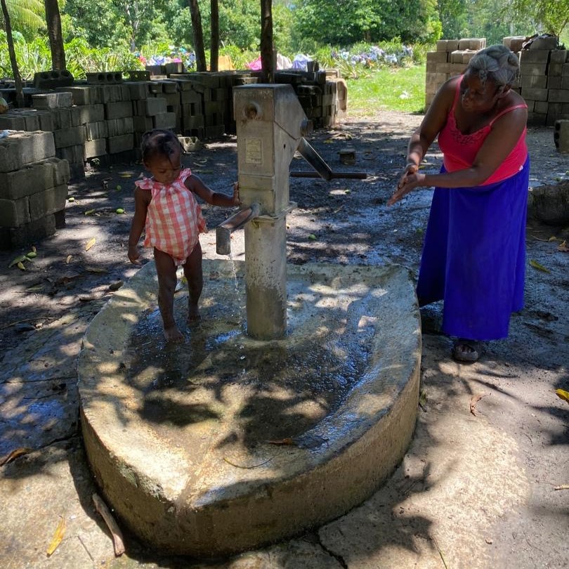 Child at repaired well