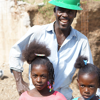 Mason with Village Children
