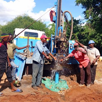 Villagers witnessing clean water for the first time 