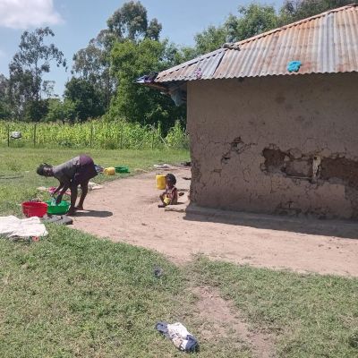 Villager at home in Kasraro community