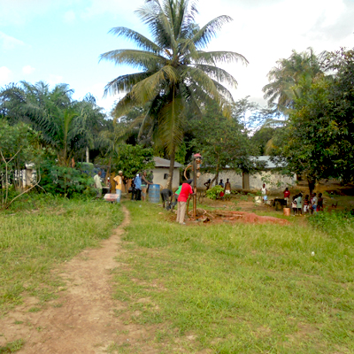Village watching while drilling being conducted