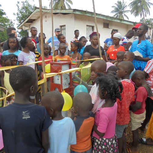 Children surrounding the New Well