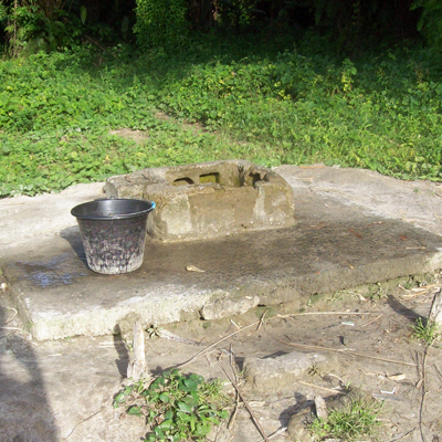 Old shallow dug well