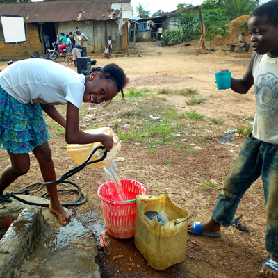 Drawing water from Old dug well