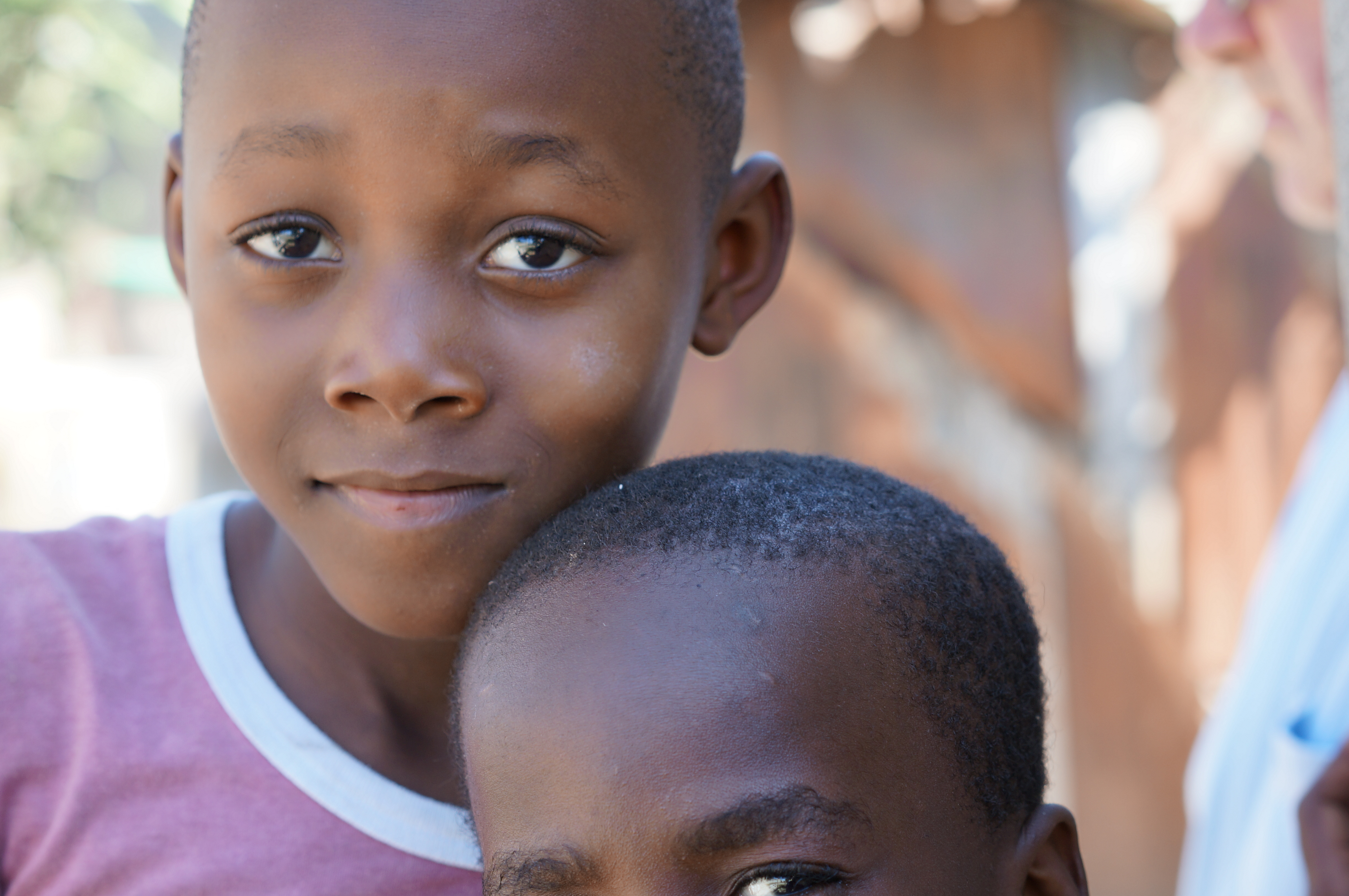 Children Watching Workers Install the Pump