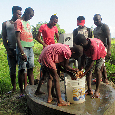 Children drinking from New Well