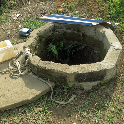 Old Dug open well