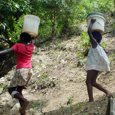 Village Children going to water in nearby swamp