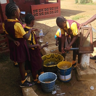 Thankful school children benefitting from safe water