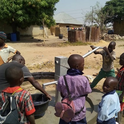 Children drawing from the new pump