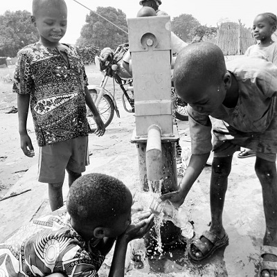 Children drawing from the new pump