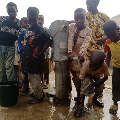 Children drawing from the new pump
