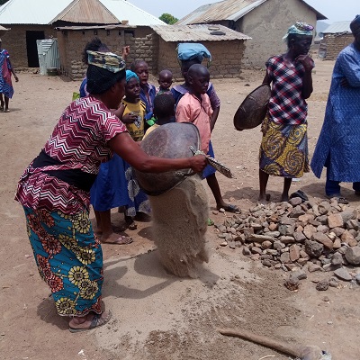 Women assist with materials