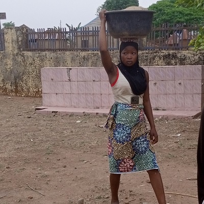 Women bring construction materials