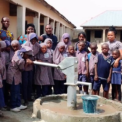 Thankful school children benefitting from safe water