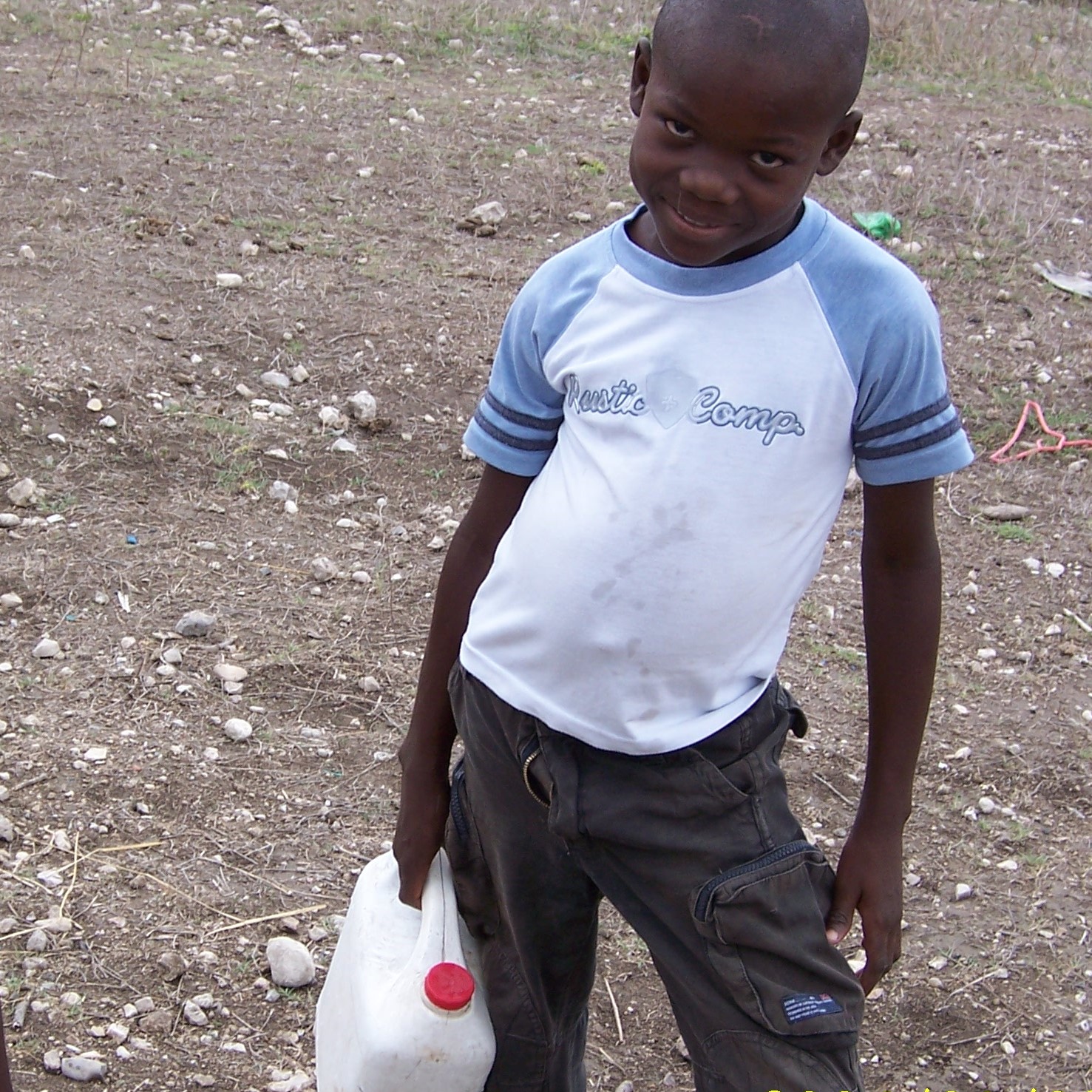 Young child going for water.