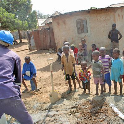 Village children watching workers