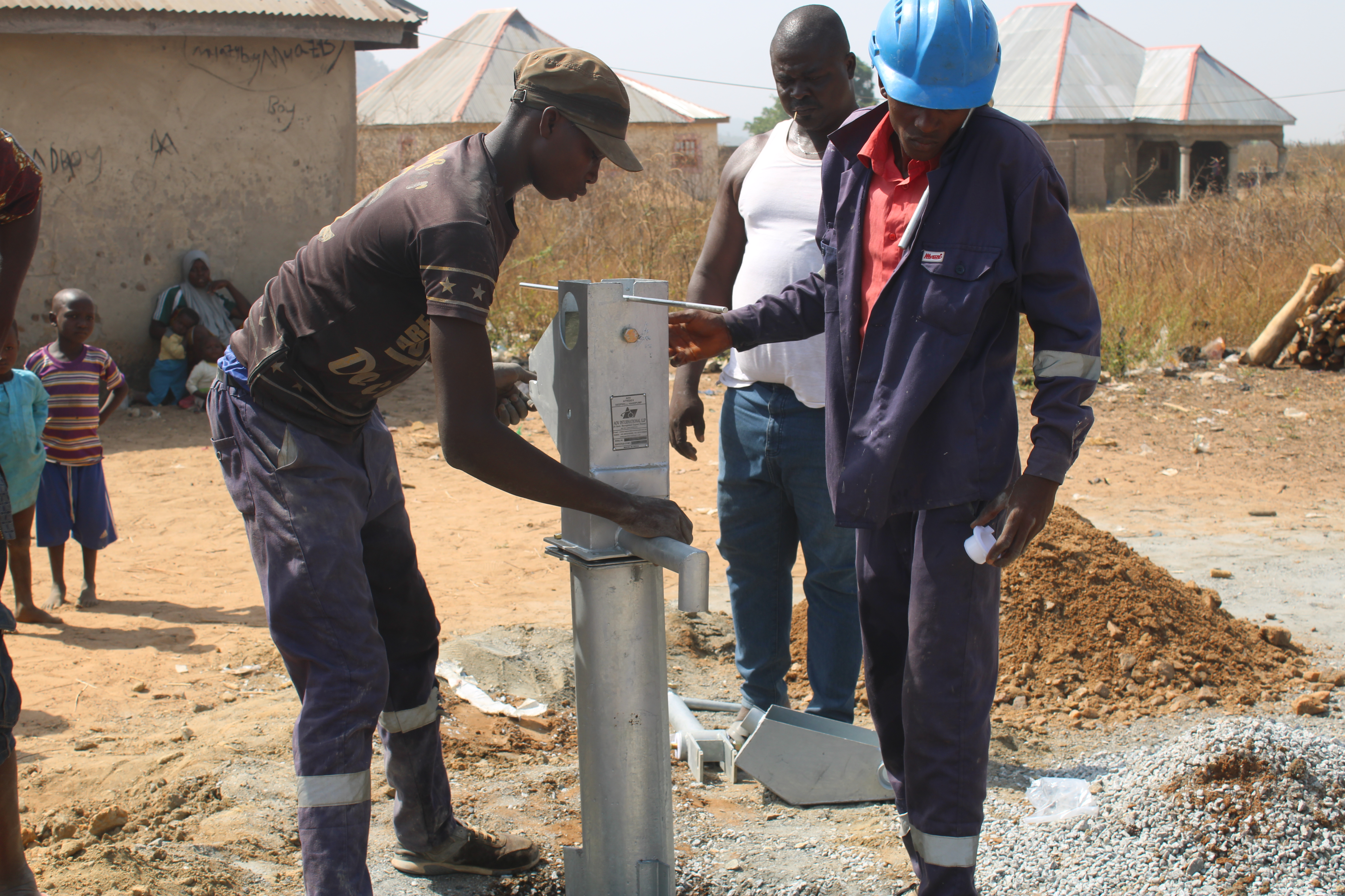 Finishing planting Afridev Pump on new borehole