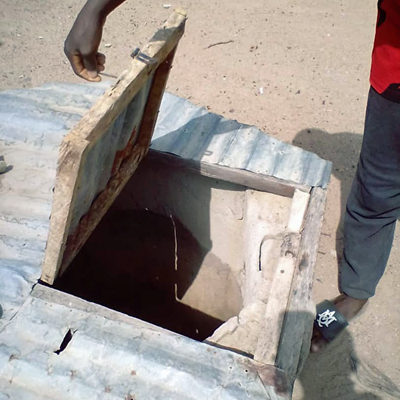 Old Dug open well