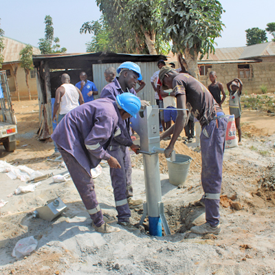 Finish work so can pour cement pad around new well