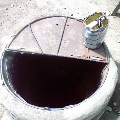 Old Dug open well