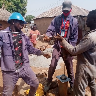 Putting New pump on borehole