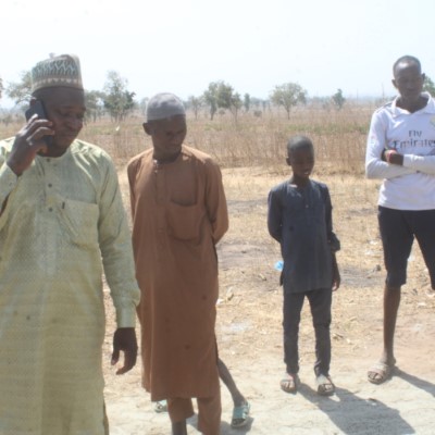 Residents watching the work progress