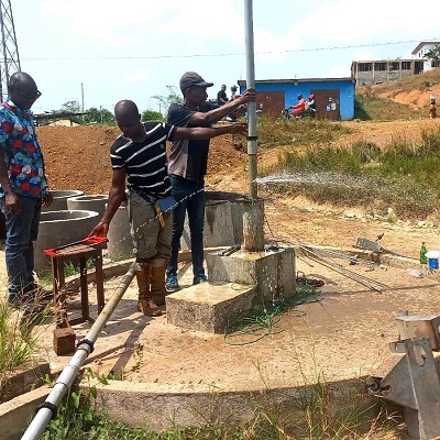 Robert D. King Town hand-pump supplies water to about 700 people 