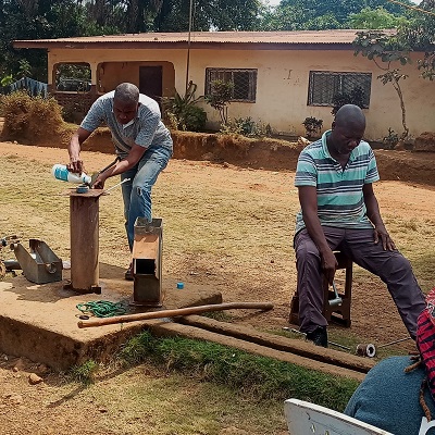 Pump repair team treating water before use
