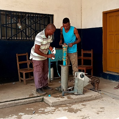 The hand-pump undergoing repair 