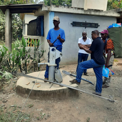 Community involved in fixing the pump
