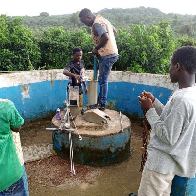 Village school's broken hand pump undergoing repair