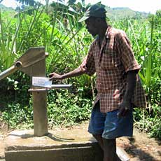 Children Drawing from New Well