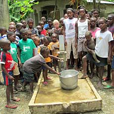 Children around Newly Repaired well