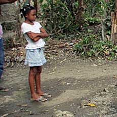 Child watching team working