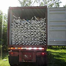Container full of New Pumps & Parts