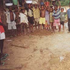 Children hauling water