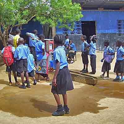 Local Village Children Gathered Around Well
